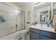 Bathroom with a glass shower door, toilet and vanity at 18315 E Amherst Dr, Aurora, CO 80013