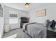 Well-lit bedroom with a comfortable bed, and simple decor at 18315 E Amherst Dr, Aurora, CO 80013