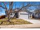 Charming single-Gathering home with a well-manicured lawn, mature trees, and a two-car garage and a neutral color scheme at 18315 E Amherst Dr, Aurora, CO 80013