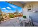 Covered patio with a table and chairs, perfect for outdoor dining and relaxing at 18315 E Amherst Dr, Aurora, CO 80013