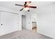 The bedroom features a ceiling fan, closet, and en-suite bathroom at 18213 E Saskatoon Pl, Parker, CO 80134