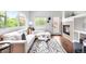 Cozy living room with modern furniture and a fireplace, showcasing a comfortable space at 18213 E Saskatoon Pl, Parker, CO 80134