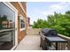 Patio with a large grill and view of neighborhood at 18213 E Saskatoon Pl, Parker, CO 80134