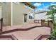 A spacious wooden back deck features a multi-level design, perfect for outdoor entertaining at 10249 Trailriders Dr, Littleton, CO 80125