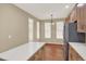 View of kitchen island and breakfast nook featuring updated stainless steel appliances at 10249 Trailriders Dr, Littleton, CO 80125