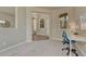 Bright and airy office space with neutral walls, grey carpet, and work space at 15886 E Stargazer Ln, Parker, CO 80134
