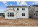 Backyard view of the home shows the white siding and windows at 39152 Clymer St, Elizabeth, CO 80107