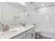 Stylish bathroom features double sinks, quartz counters, and a tiled shower-tub combination at 39152 Clymer St, Elizabeth, CO 80107