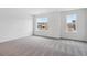 Spacious bedroom with plush carpeting and large windows that offer great views and natural light at 39152 Clymer St, Elizabeth, CO 80107