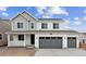 Charming two-story home featuring a three-car garage and covered porch at 39152 Clymer St, Elizabeth, CO 80107