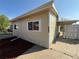 Well-maintained single-story home with a covered entrance and tidy yard at 9036 Mandel St, Denver, CO 80260
