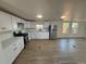 Modern kitchen featuring new appliances and lighting at 9036 Mandel St, Denver, CO 80260