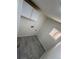This laundry room features tile flooring, a window, and hookups for a washer and dryer at 9036 Mandel St, Denver, CO 80260