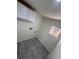 This laundry room features tile flooring, a window, and hookups for a washer and dryer at 9036 Mandel St, Denver, CO 80260