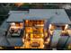 Stunning aerial view showcases rooftop terrace and modern architecture with outdoor lounge and dining areas at 2539 E 5Th Ave, Denver, CO 80206