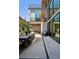 Well-designed backyard features outdoor dining and lounging areas at 2539 E 5Th Ave, Denver, CO 80206