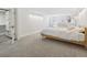 Spacious basement bedroom features built-in closet and comfortable seating area at 1355 Hudson St, Denver, CO 80220