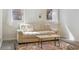 Inviting living area features a comfortable sofa, natural light, and a decorative coffee table at 1355 Hudson St, Denver, CO 80220