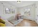 Bright home office offers great natural light, hardwood floors, and a comfortable workspace at 1355 Hudson St, Denver, CO 80220