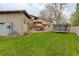 A backyard featuring a well-manicured lawn and a trampoline at 2931 S Cook St, Denver, CO 80210