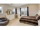 Comfortable bedroom featuring a desk, dresser, and closet at 2931 S Cook St, Denver, CO 80210