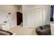 Well-lit bedroom features natural light, storage, and closet at 2931 S Cook St, Denver, CO 80210