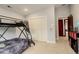 Bright bedroom featuring a bunk bed and closet at 2931 S Cook St, Denver, CO 80210