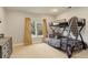 Comfortable bedroom featuring a bunk bed and natural light at 2931 S Cook St, Denver, CO 80210