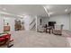 Finished basement with neutral carpet features a sitting area and walkout at 5223 Gray Wolf Ln, Castle Rock, CO 80104