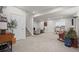 Spacious finished basement with neutral carpet features a sitting area and stairs at 5223 Gray Wolf Ln, Castle Rock, CO 80104