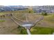 This aerial showcases the dog park with fenced-in areas and walking trails, perfect for pet owners at 5223 Gray Wolf Ln, Castle Rock, CO 80104