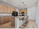 Well-equipped kitchen with a large island, granite countertops, and stainless steel appliances at 5223 Gray Wolf Ln, Castle Rock, CO 80104