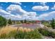 Community playground with a climbing structure, gazebo, and landscaped surroundings at 5223 Gray Wolf Ln, Castle Rock, CO 80104