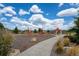 Community playground with a gazebo, climbing structures, and landscaped surroundings at 5223 Gray Wolf Ln, Castle Rock, CO 80104