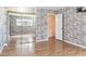 Bright bedroom featuring ample closet space, light wood flooring and a neutral color scheme at 6400 E Mississippi Ave, Denver, CO 80224