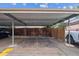 Covered carport offering ample parking for two vehicles at 6400 E Mississippi Ave, Denver, CO 80224