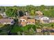 Aerial shot of the property showcasing the spacious backyard, shed, and proximity to neighboring homes at 7351 S Marion St, Centennial, CO 80122