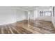 Spacious living room features wood floors, white walls, and abundant light at 7351 S Marion St, Centennial, CO 80122