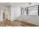 Bright living room offers views of the updated kitchen and a laundry area at 7351 S Marion St, Centennial, CO 80122