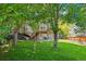 The backyard blends perfectly with the lush surroundings of the house at 775 Poppywood Dr, Highlands Ranch, CO 80126