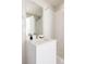 Clean bathroom featuring a modern vanity and a shower/tub combination with subway tile at 3145 W 19Th Ave, Denver, CO 80204