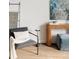 Well-decorated living room with a comfy chair, a ladder blanket rack, and a contemporary-style console table at 3145 W 19Th Ave, Denver, CO 80204