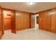 Basement area with wooden panels and a doorway at 2885 S Gilpin St, Denver, CO 80210