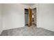 Cozy bedroom featuring a closet and neutral carpeting at 2885 S Gilpin St, Denver, CO 80210