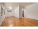 Spacious living room with hardwood floors, neutral paint, and natural light at 2885 S Gilpin St, Denver, CO 80210