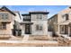 Charming two-story home featuring a modern facade and inviting front yard at 8777 Whiteclover St, Littleton, CO 80125