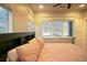 Bedroom features large windows for lots of light at 10018 E 62Nd Ave, Denver, CO 80238