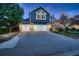 Charming two-story home with a three-car garage and a beautifully landscaped front yard, perfect for families at 13076 Marion Dr, Thornton, CO 80241