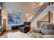 Spacious living room with tall ceilings, hardwood floors, and a large window at 13076 Marion Dr, Thornton, CO 80241