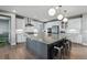 Spacious kitchen with large island, stainless steel appliances, and modern finishes at 6400 Barnstead Dr, Castle Pines, CO 80108
